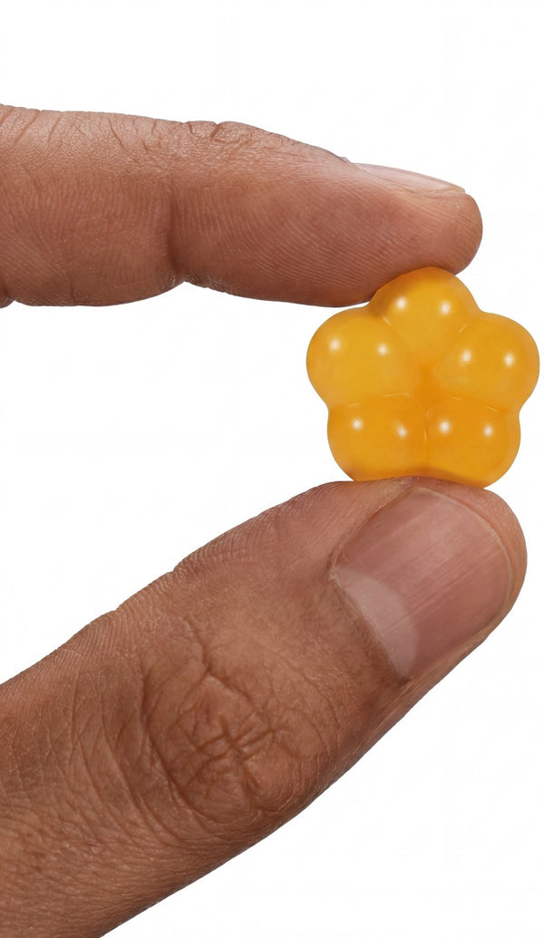Hand holding gummy